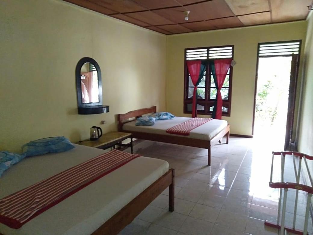 Sibayak Guesthouse Tuk Tuk Buitenkant foto