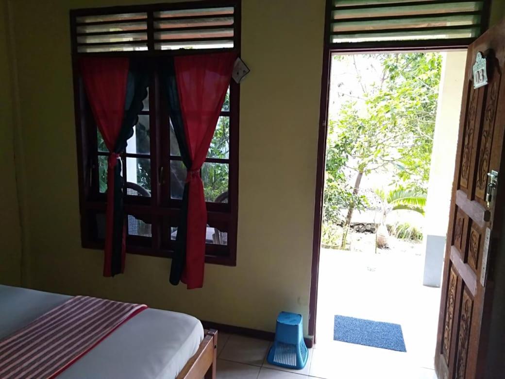 Sibayak Guesthouse Tuk Tuk Buitenkant foto