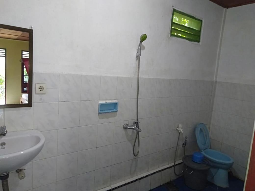 Sibayak Guesthouse Tuk Tuk Buitenkant foto