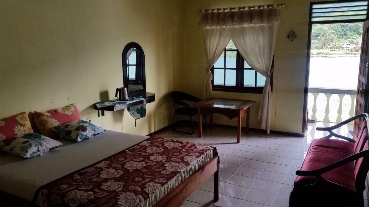 Sibayak Guesthouse Tuk Tuk Buitenkant foto