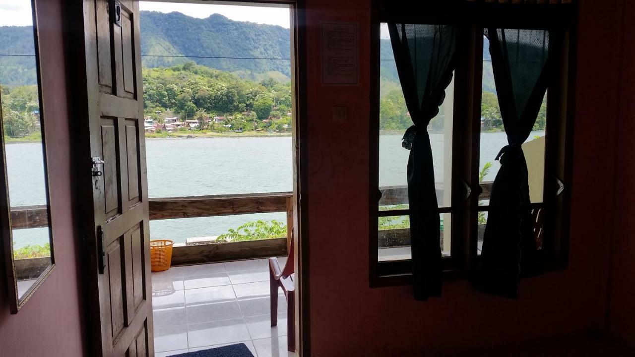 Sibayak Guesthouse Tuk Tuk Buitenkant foto